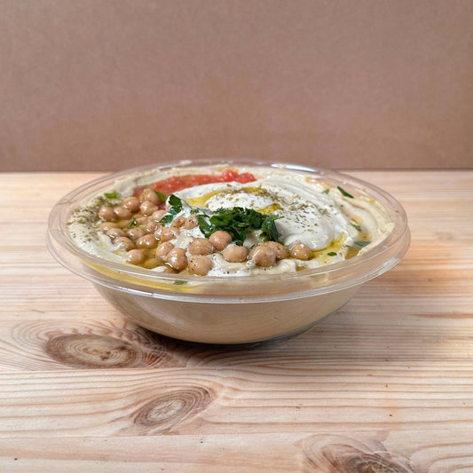 Original hummus dip topped with chickpeas and olive oil – Middle Eastern catering Dublin