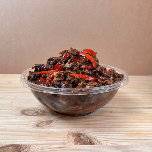 Flavorful Fried Aubergines with grilled red bell peppers, drizzled with a tangy vinegar and lemon dressing.